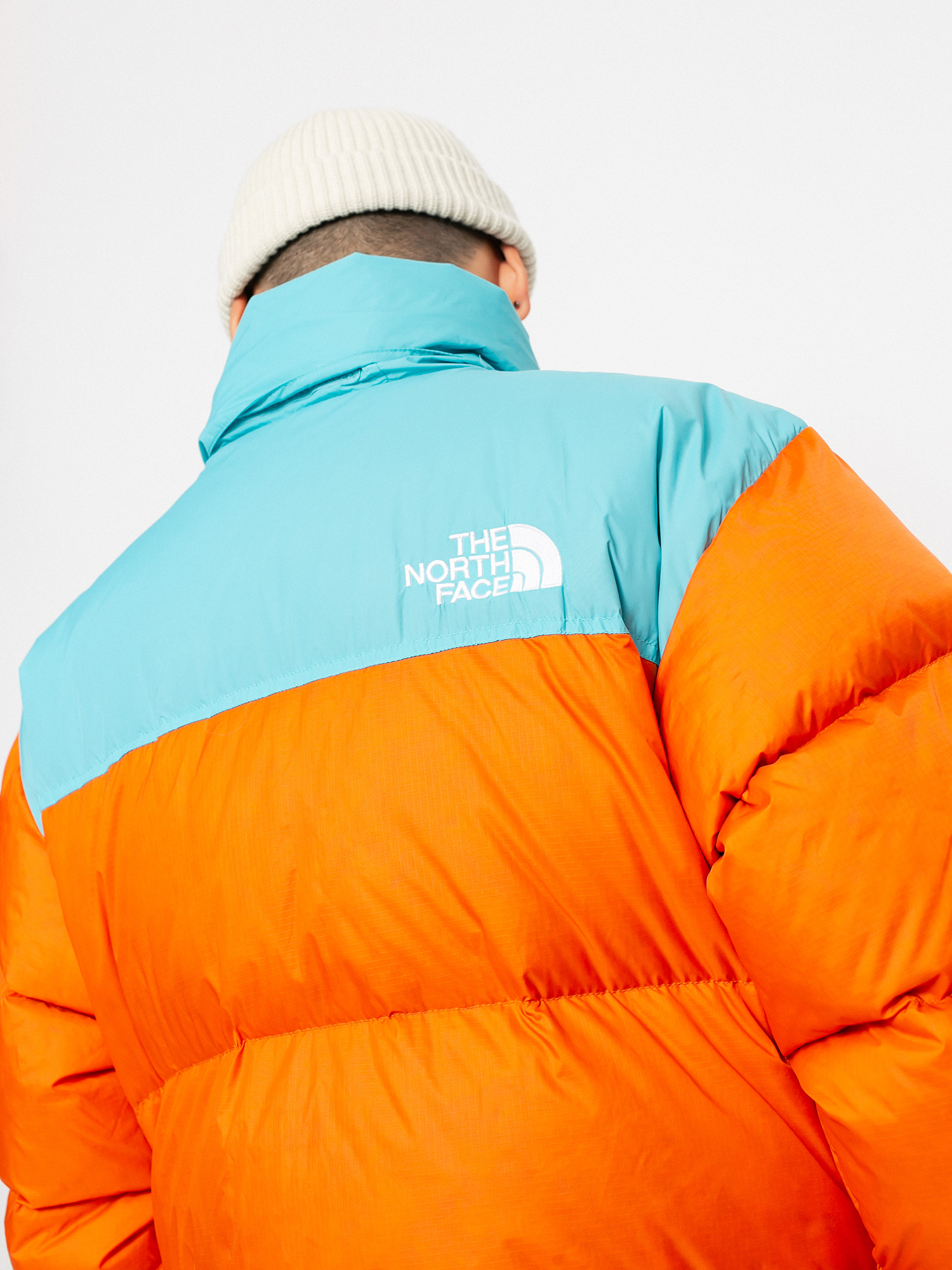 Geacă The North Face 1996 Retro Nuptse (red orange/transantarctic blue)