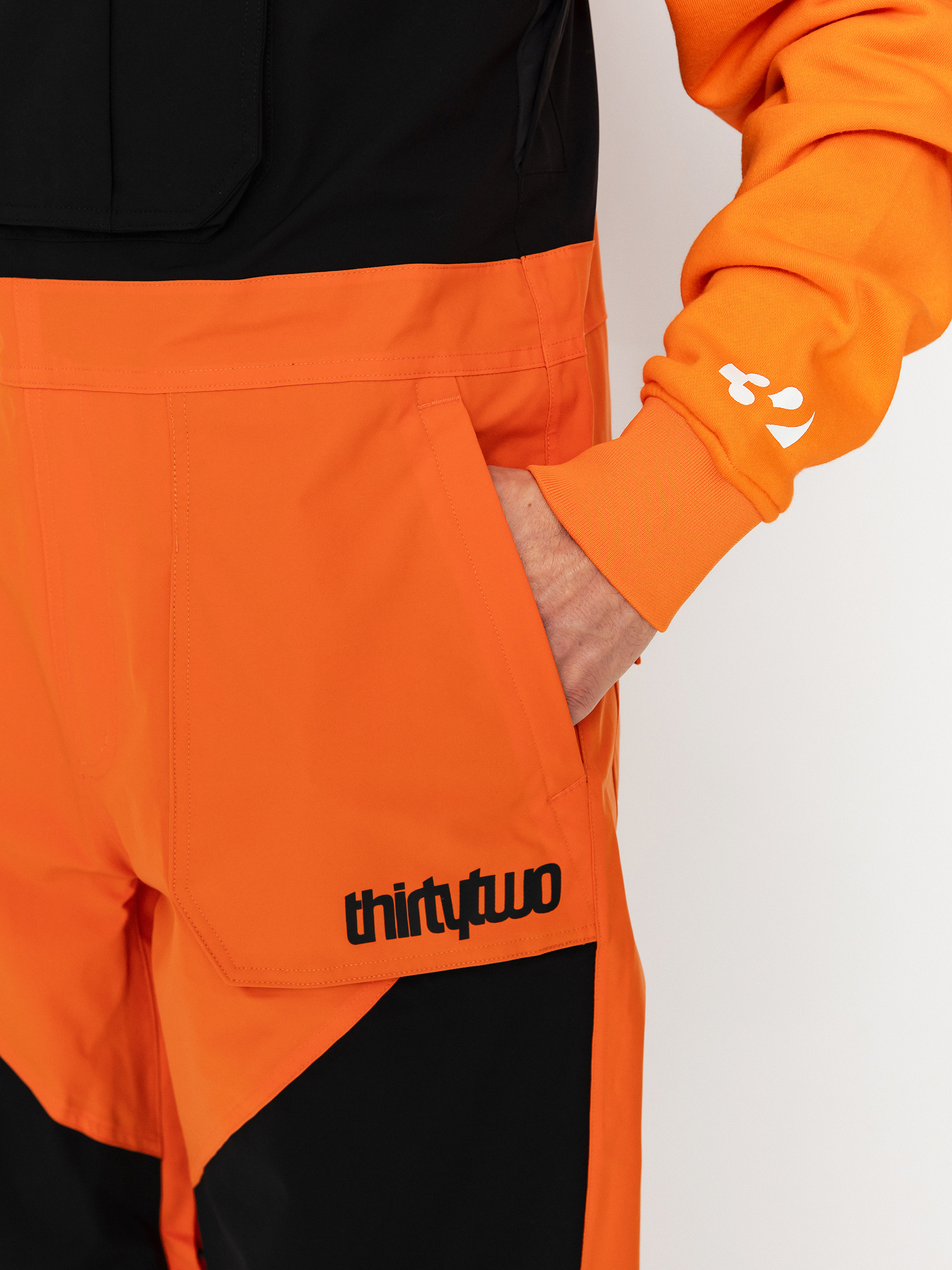 Pentru bărbați Pantaloni pentru snowboard ThirtyTwo Basement Bib (black/orange)