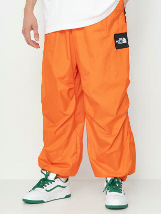 Pantaloni The North Face X Yinka Ilori Windshell (red orange)