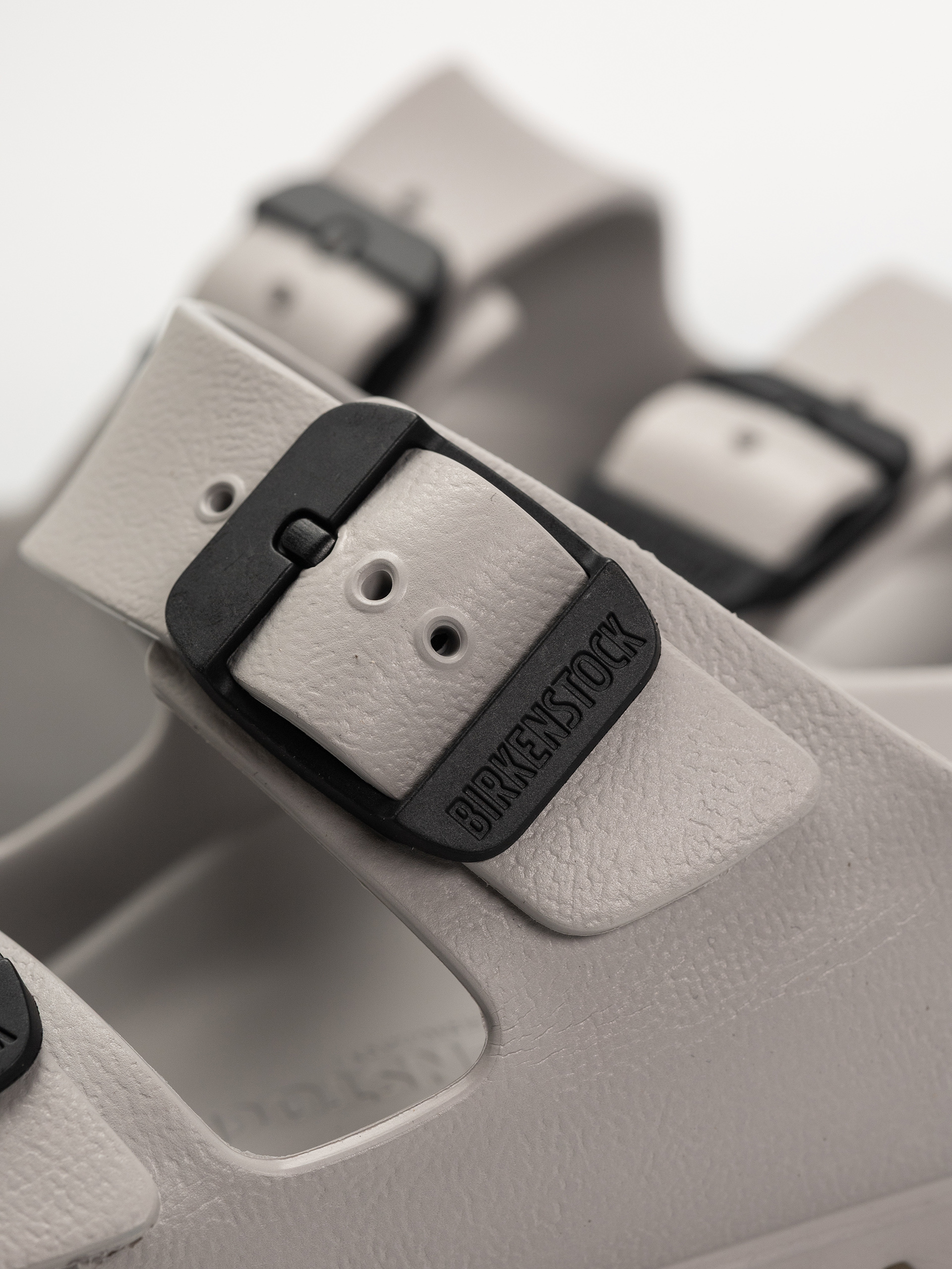 Șlapi Birkenstock Arizona Stealth Buckle EVA Narrow Wmn (stone coin/black)