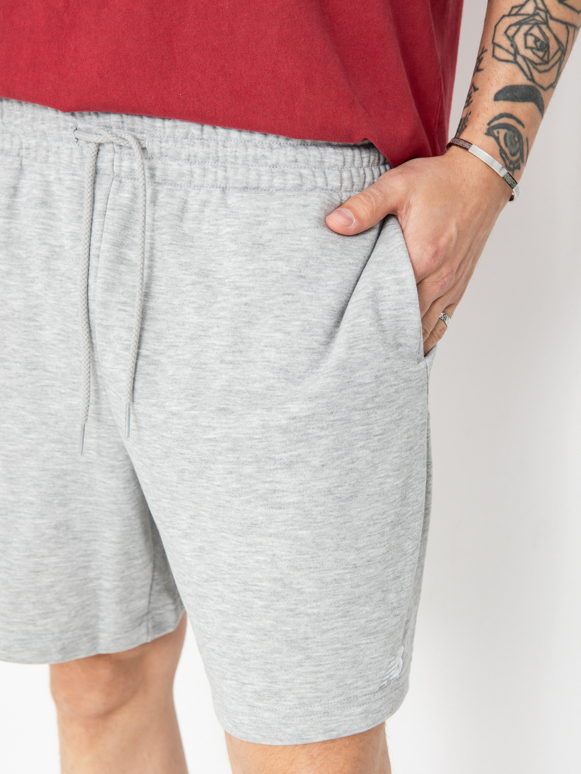 Pantaloni scurți New Balance French Terry (athletic gre)