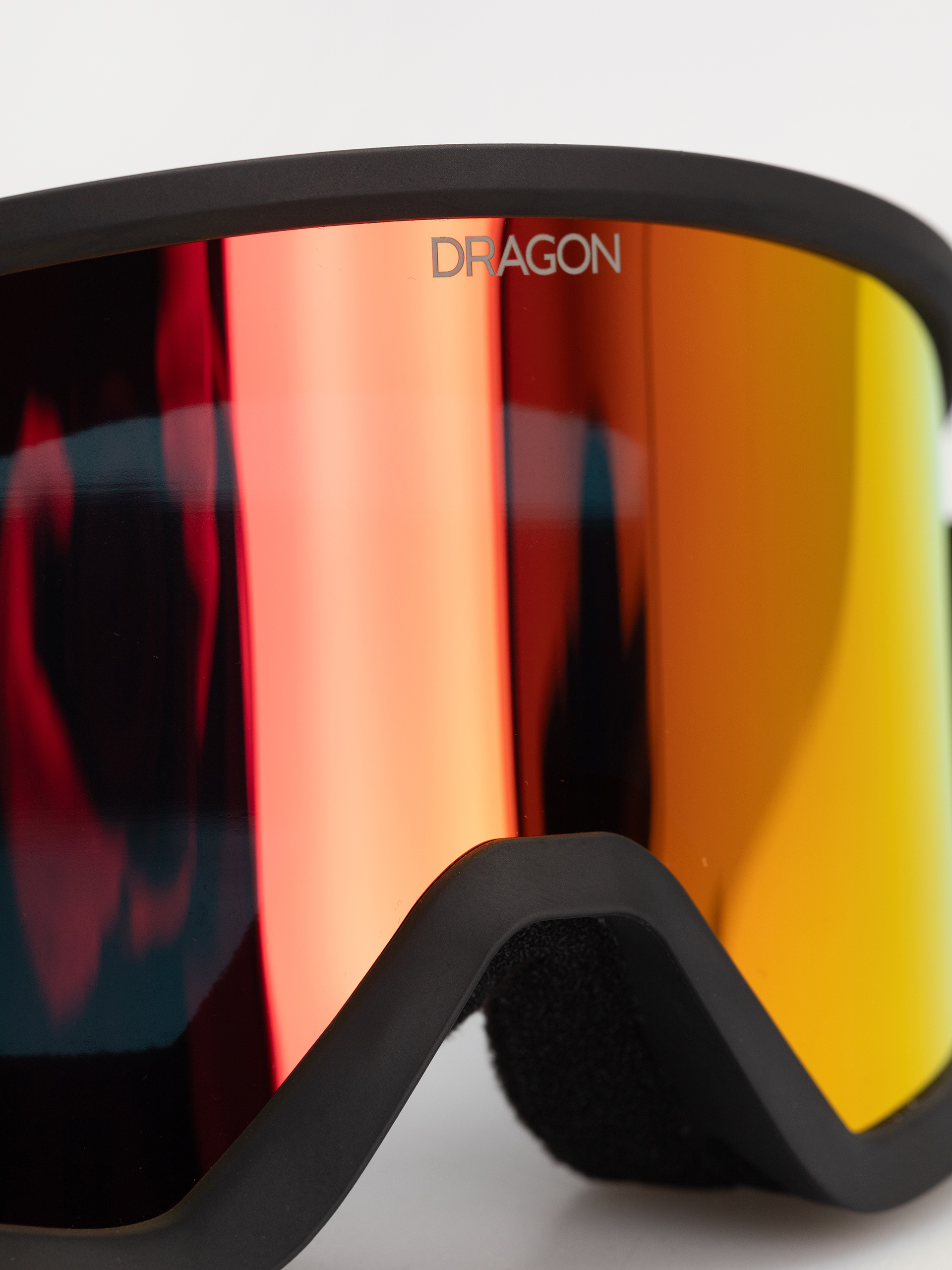 Ochelari pentru snowboard Dragon DX3 OTG (black/lumalens red ion)