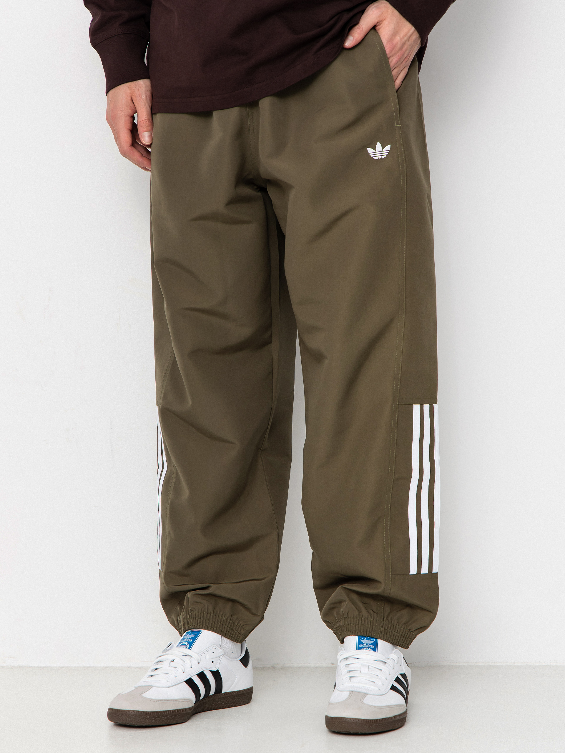 Pantaloni adidas Gatsele (olistr/white)