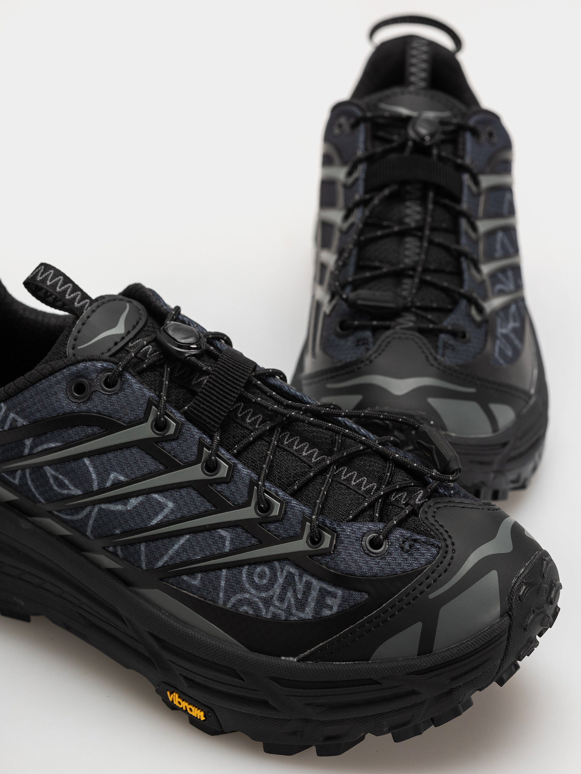 Pantofi Hoka Mafate Three 2 Wordmark (black/outer orbit)