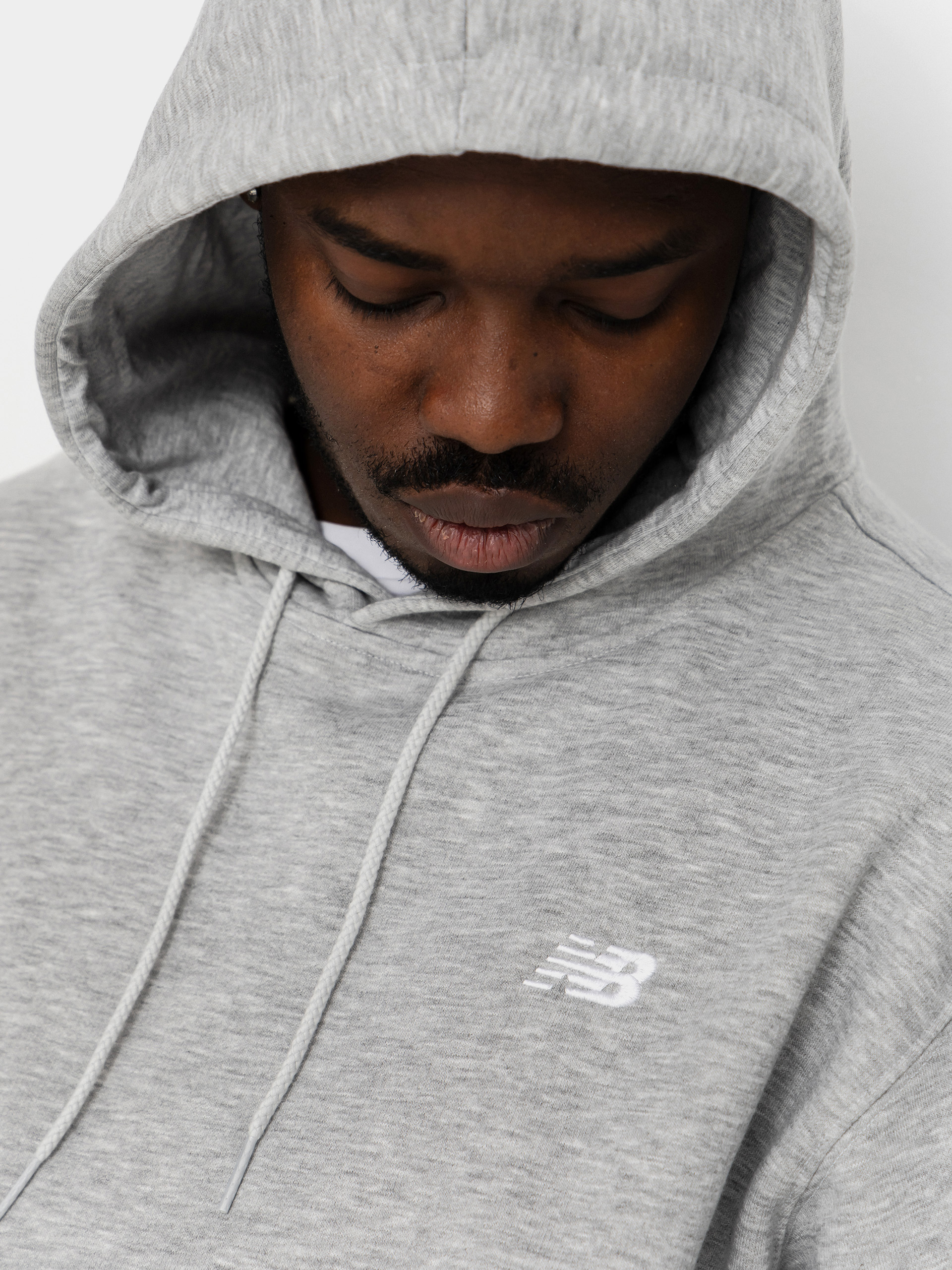 Hanorac cu glugă New Balance Sport Essentials Fleece HD (athletic grey)