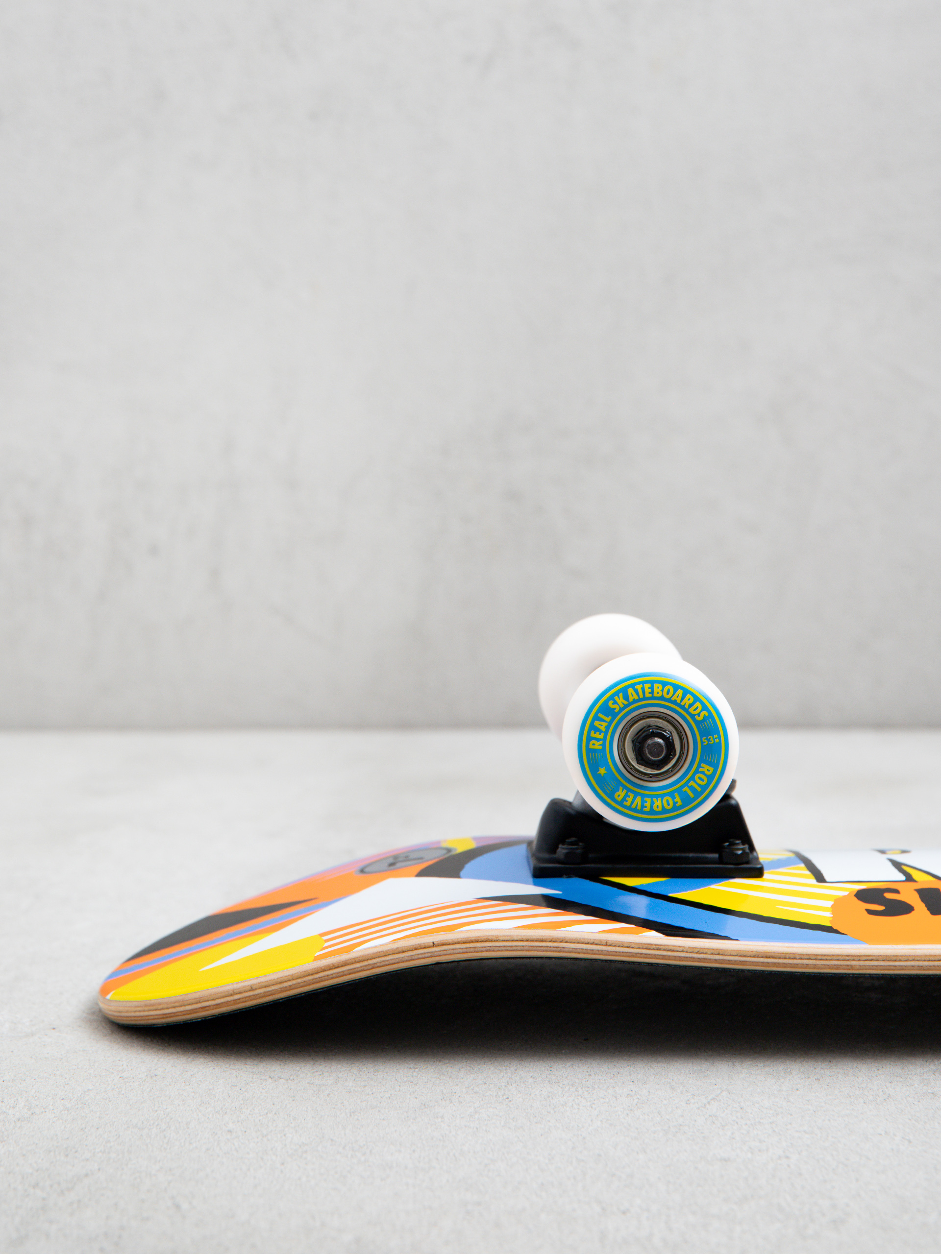 Skateboard Real Hatched (orange/blue/yellow)