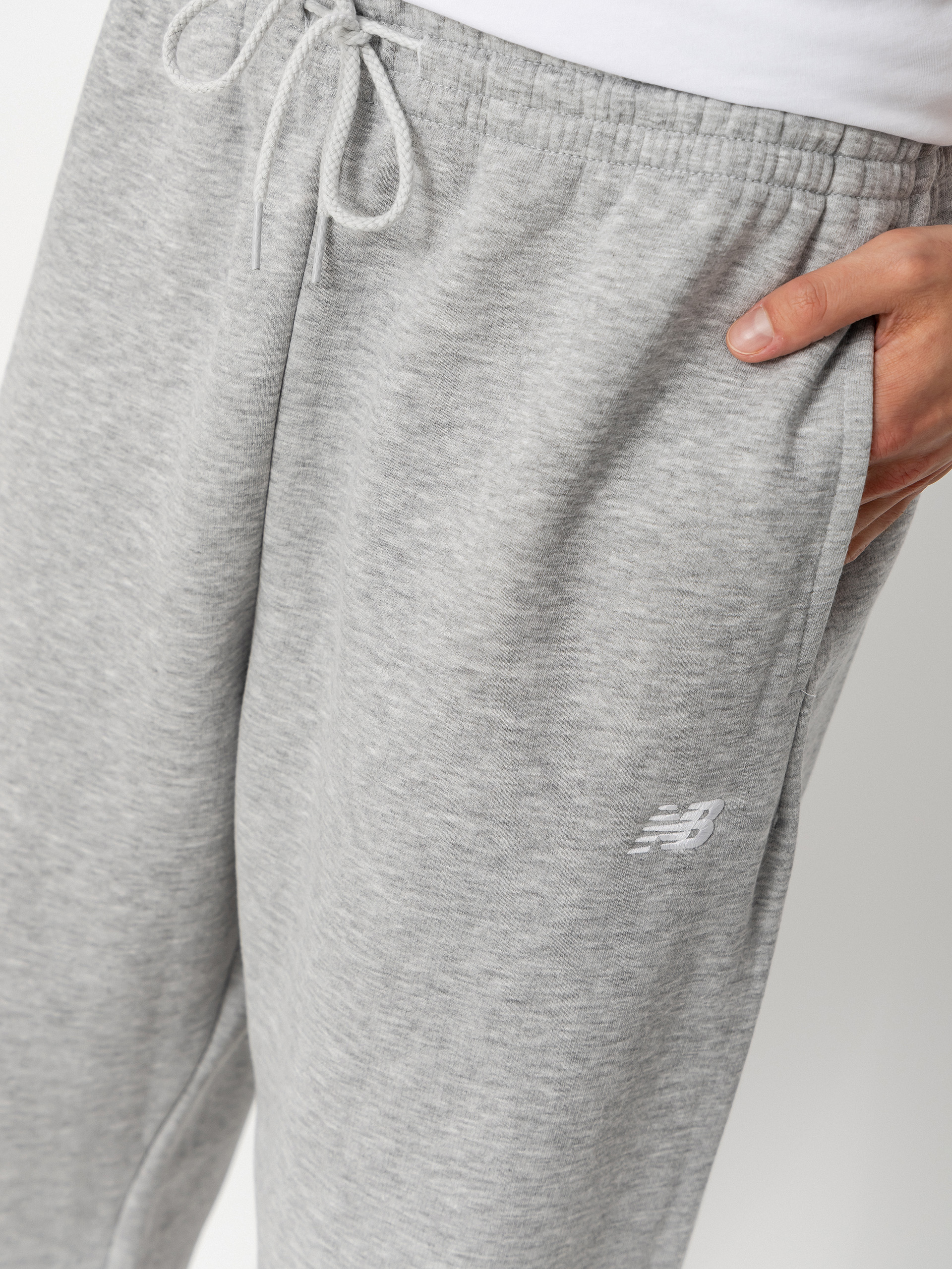 Pantaloni New Balance Sport Essentials Fleece Jogger (athletic grey)